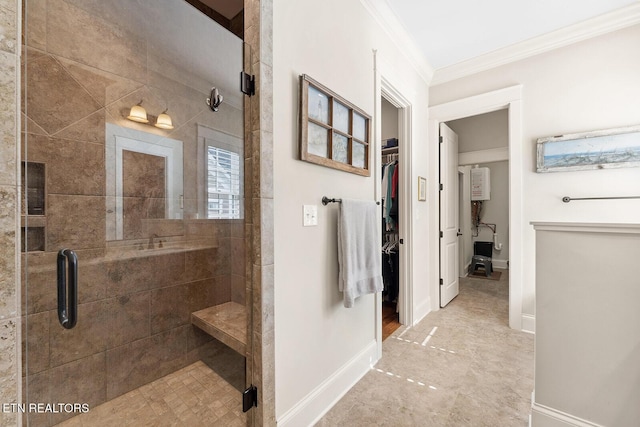 full bath featuring baseboards, a spacious closet, a stall shower, and crown molding