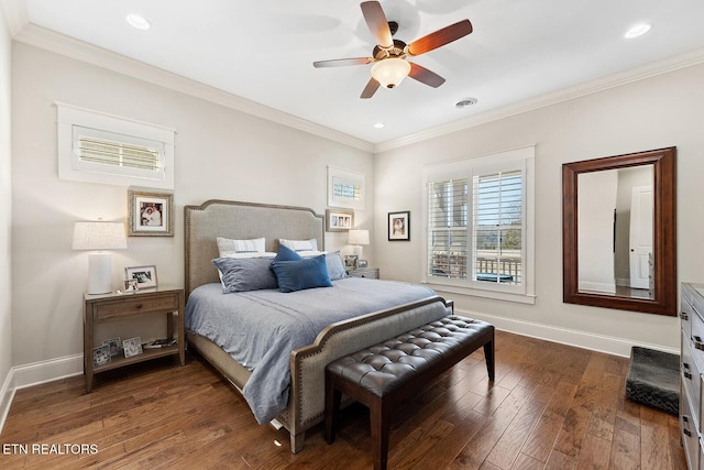 bedroom with visible vents, baseboards, dark wood-type flooring, crown molding, and recessed lighting