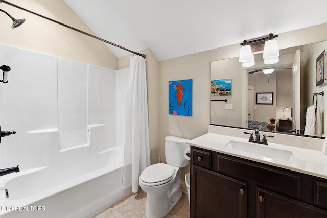 full bathroom with lofted ceiling, vanity, toilet, and shower / tub combo with curtain