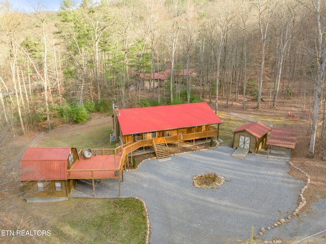 drone / aerial view with a view of trees