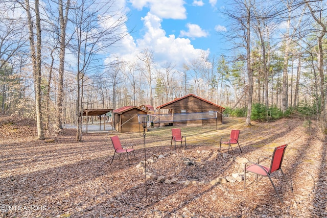 view of yard with an outdoor structure