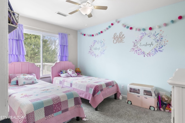 bedroom with visible vents, ceiling fan, and carpet flooring