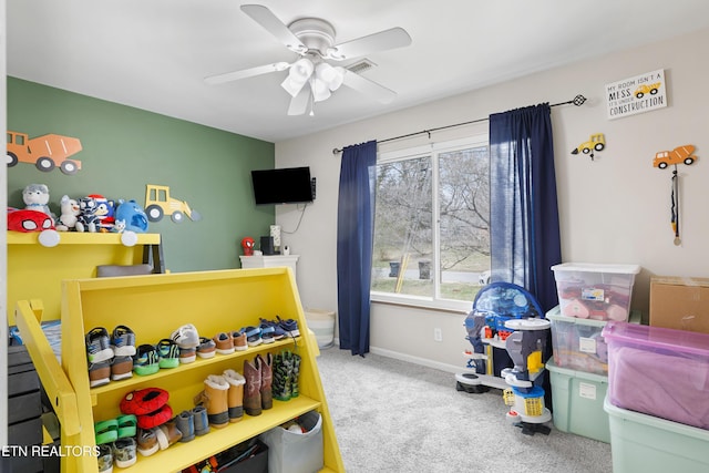 bedroom featuring ceiling fan, carpet, visible vents, and baseboards