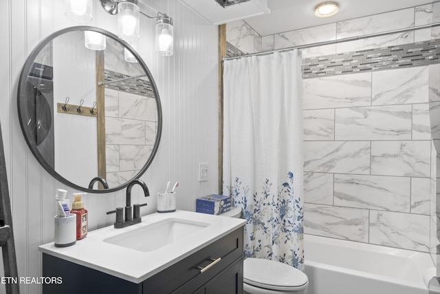 bathroom featuring vanity, toilet, and shower / tub combo