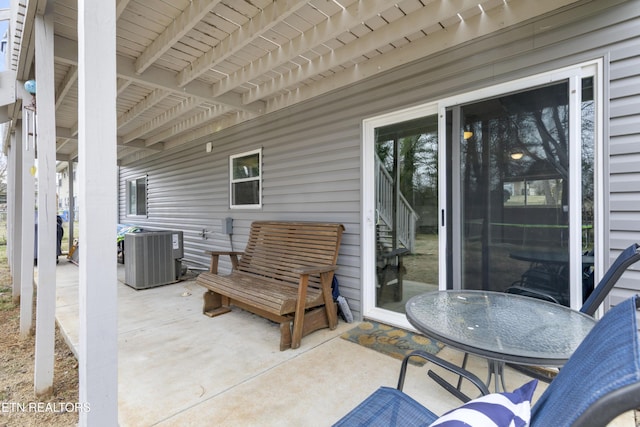 view of patio with central AC unit