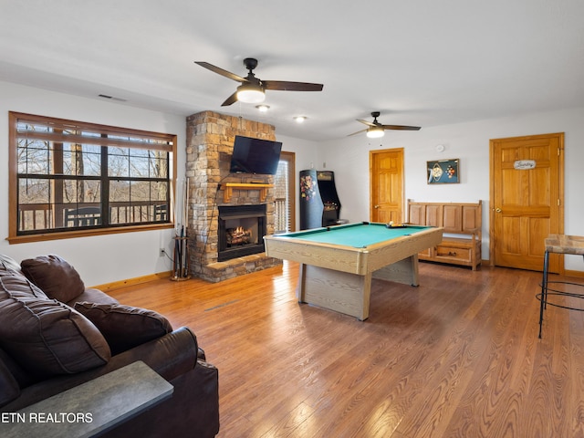 game room with a fireplace, billiards, wood finished floors, visible vents, and baseboards