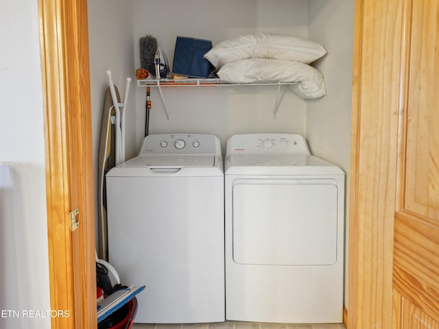 laundry room featuring laundry area and separate washer and dryer