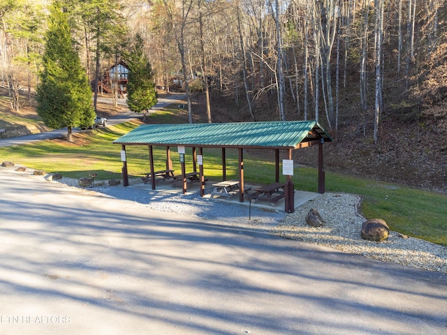 view of home's community featuring a lawn and a gazebo