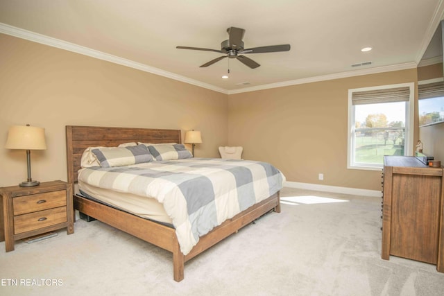 bedroom with light colored carpet, a ceiling fan, baseboards, visible vents, and ornamental molding