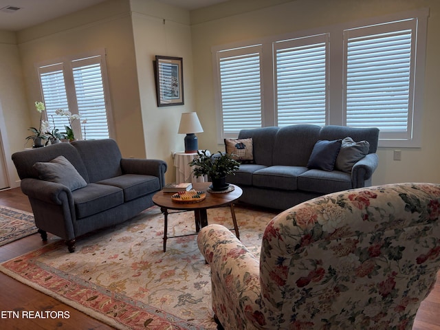 193 Holly Tree Dr, Crossville, TN 38555 - living room featuring wood finished floors and visible vents