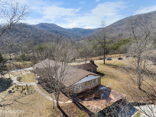 drone / aerial view featuring a mountain view