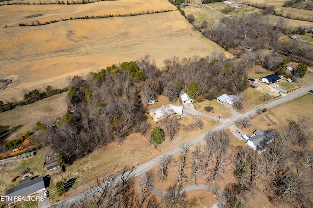 birds eye view of property featuring a rural view