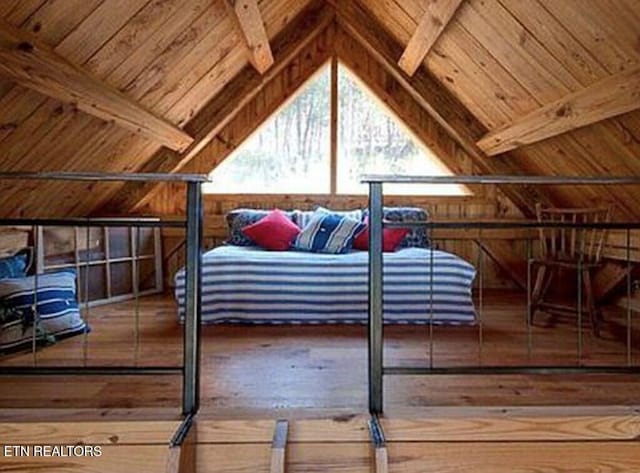 360 Spurlock Hollow Ln, Gainesboro, TN 38562 - bedroom with lofted ceiling with beams, wooden ceiling, wooden walls, and hardwood / wood-style floors
