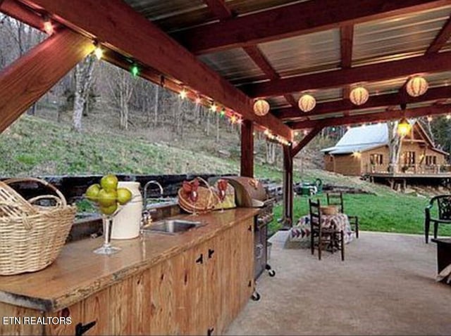 360 Spurlock Hollow Ln, Gainesboro, TN 38562 - view of patio with an outdoor kitchen and a sink
