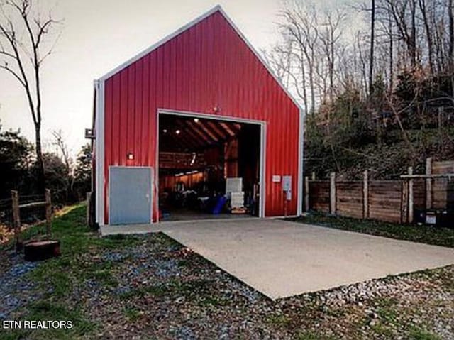 360 Spurlock Hollow Ln, Gainesboro, TN 38562 - view of outbuilding with fence, driveway, and an outdoor structure