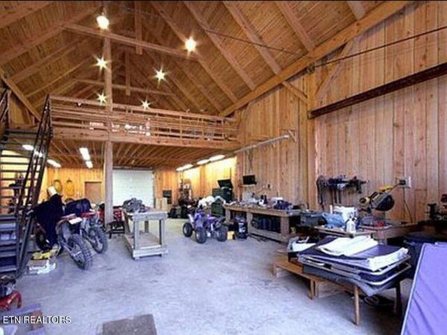 360 Spurlock Hollow Ln, Gainesboro, TN 38562 - miscellaneous room with high vaulted ceiling and a workshop area