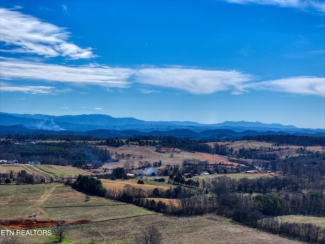 property view of mountains featuring a rural view