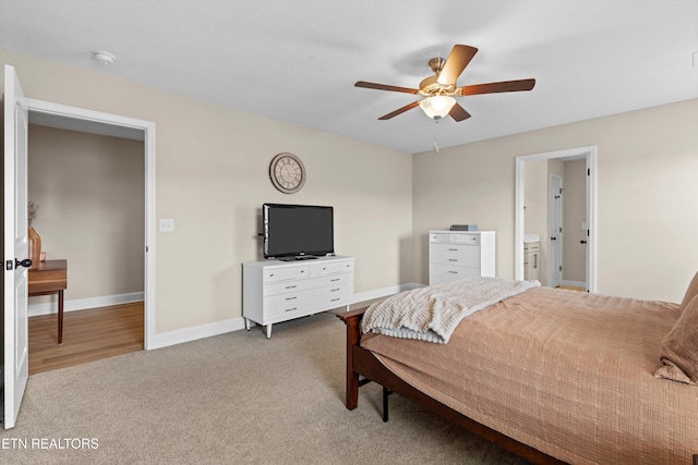 bedroom with carpet, baseboards, and a ceiling fan