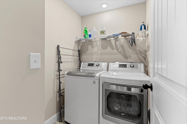 laundry room featuring laundry area and independent washer and dryer