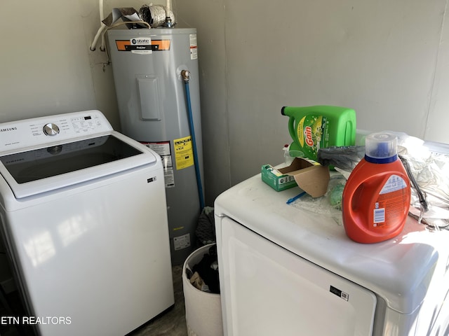 clothes washing area featuring laundry area and electric water heater