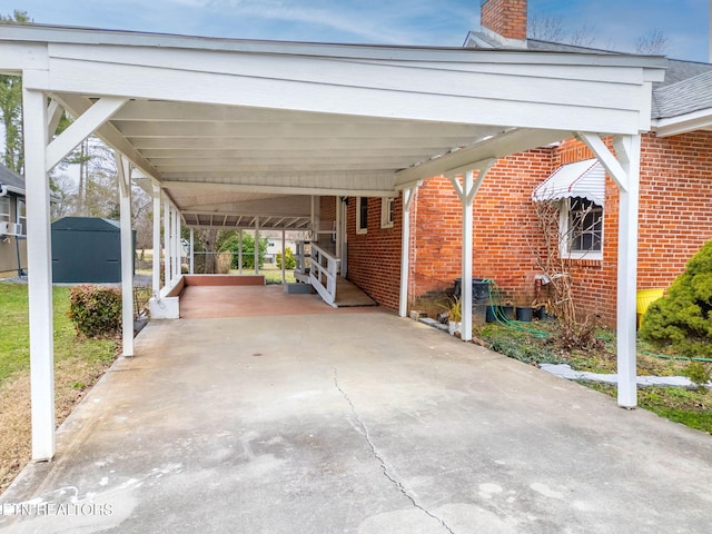 view of parking / parking lot featuring driveway