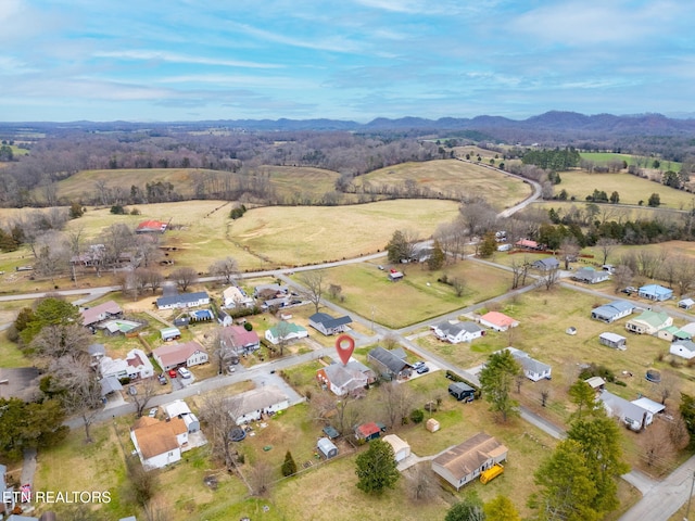 birds eye view of property with a residential view and a rural view