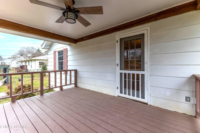 wooden terrace with ceiling fan