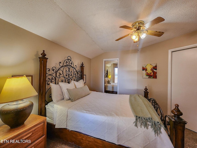 bedroom featuring lofted ceiling, ceiling fan, and a textured ceiling