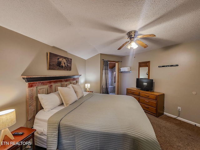 carpeted bedroom featuring a ceiling fan, baseboards, and a textured ceiling