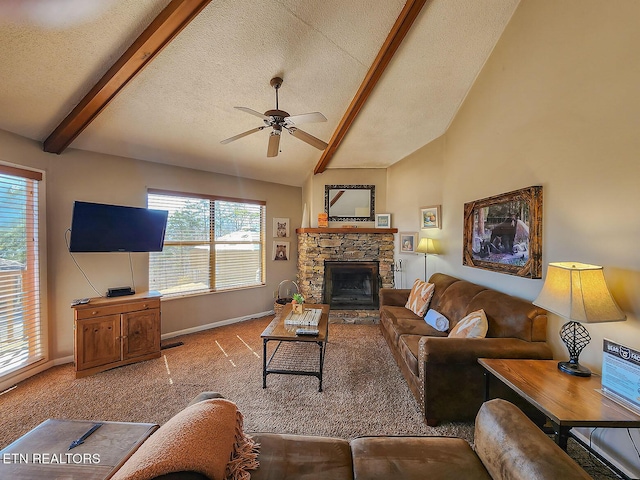 carpeted living room featuring baseboards, lofted ceiling with beams, ceiling fan, a textured ceiling, and a fireplace