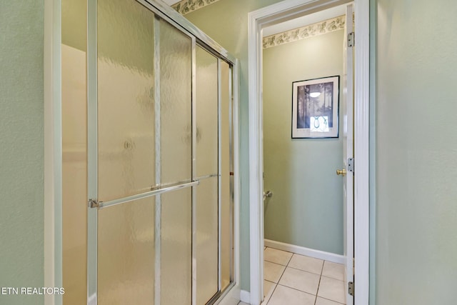12 Killearn Ct, Crossville, TN 38558 - bathroom featuring a shower stall, tile patterned floors, and baseboards