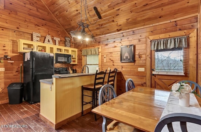 kitchen featuring wooden ceiling, dark wood-type flooring, vaulted ceiling, black appliances, and glass insert cabinets