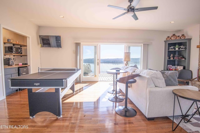 game room featuring ceiling fan, wood finished floors, and recessed lighting