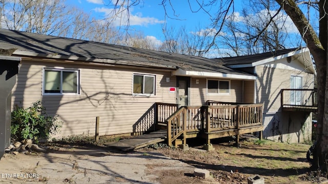 view of front facade with a deck