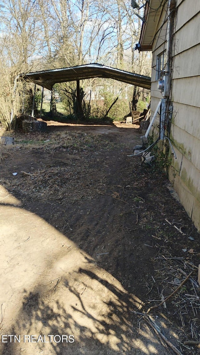 exterior space featuring a carport