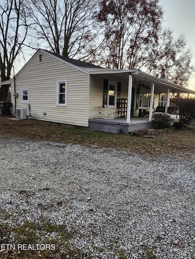 back of property featuring a patio and central AC unit