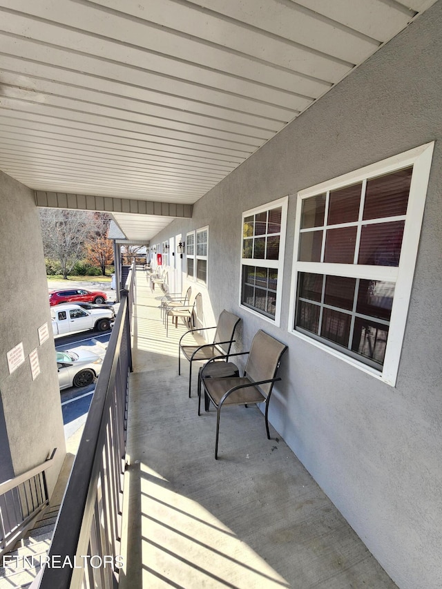 balcony featuring a sunroom