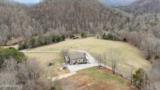 aerial view with a forest view and a rural view