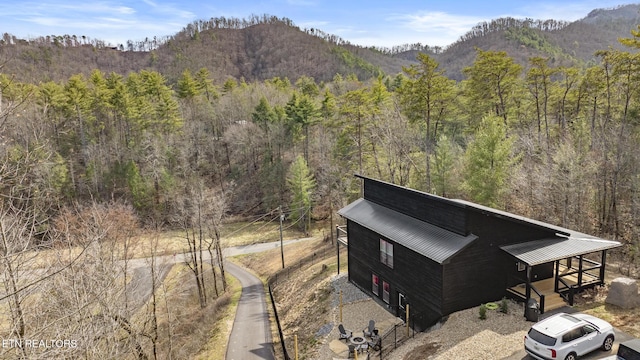 property view of mountains with a forest view