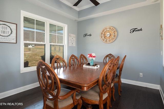 dining room with ceiling fan, crown molding, dark wood finished floors, and baseboards