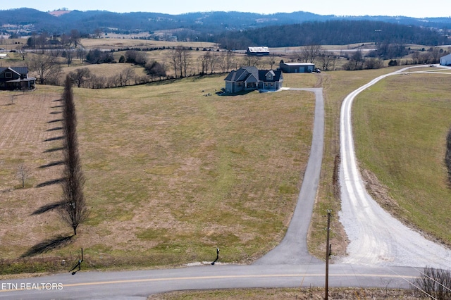 aerial view featuring a mountain view and a rural view