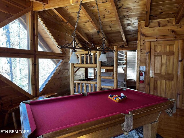 rec room with wooden ceiling, a healthy amount of sunlight, vaulted ceiling with beams, and wood finished floors