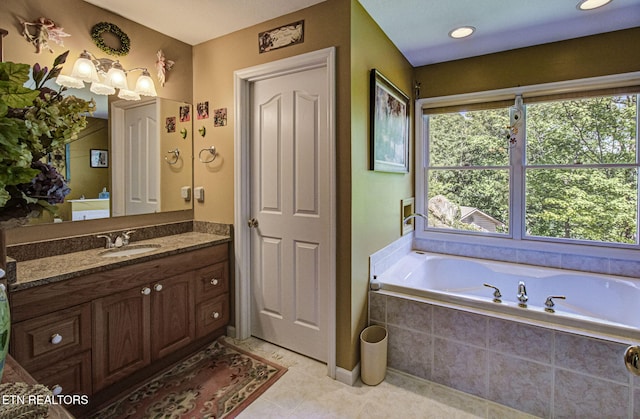 954 Pawnee Ct, Sevierville, TN 37876 - bathroom with tile patterned floors, a bath, and vanity