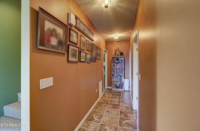 954 Pawnee Ct, Sevierville, TN 37876 - hall featuring baseboards, stairway, and visible vents