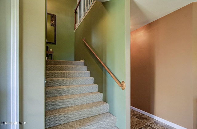 954 Pawnee Ct, Sevierville, TN 37876 - stairs featuring tile patterned flooring and baseboards