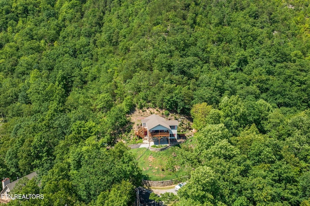 954 Pawnee Ct, Sevierville, TN 37876 - drone / aerial view with a wooded view