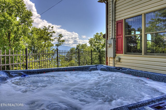 954 Pawnee Ct, Sevierville, TN 37876 - exterior space featuring a hot tub, fence, and electric meter