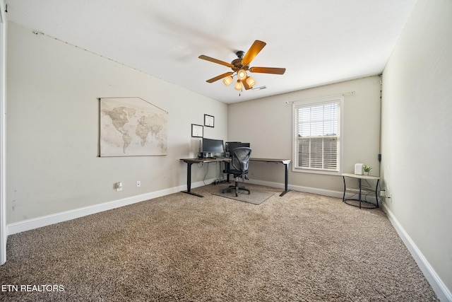 home office with carpet, baseboards, and a ceiling fan