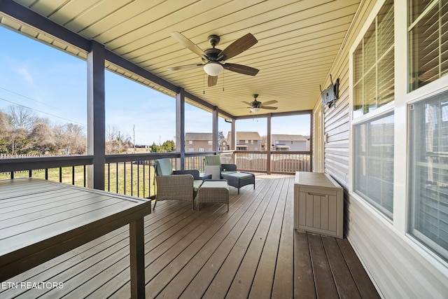 deck featuring a ceiling fan