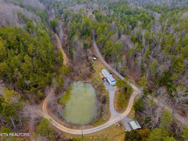 aerial view with a wooded view